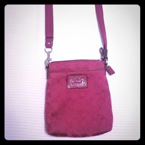 Red logo coach purse